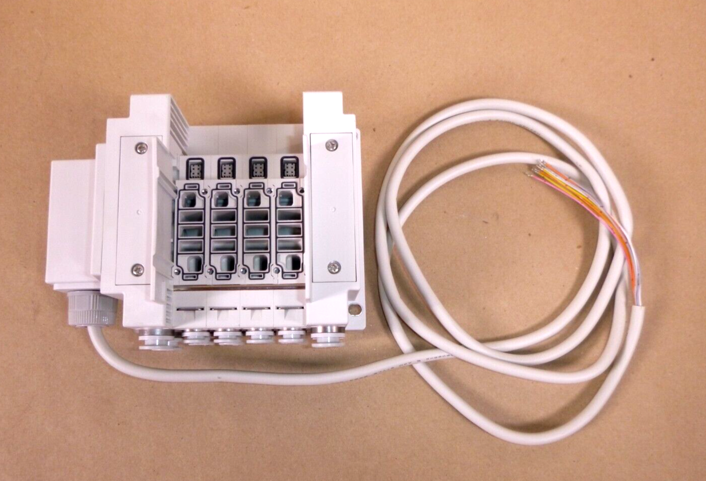 New SMC SS5Y5-10L32-04D-C8, 4 Station Manifold Base | Electrical MRO Replacement Parts & Components and Commercial Electrical Supplies Company