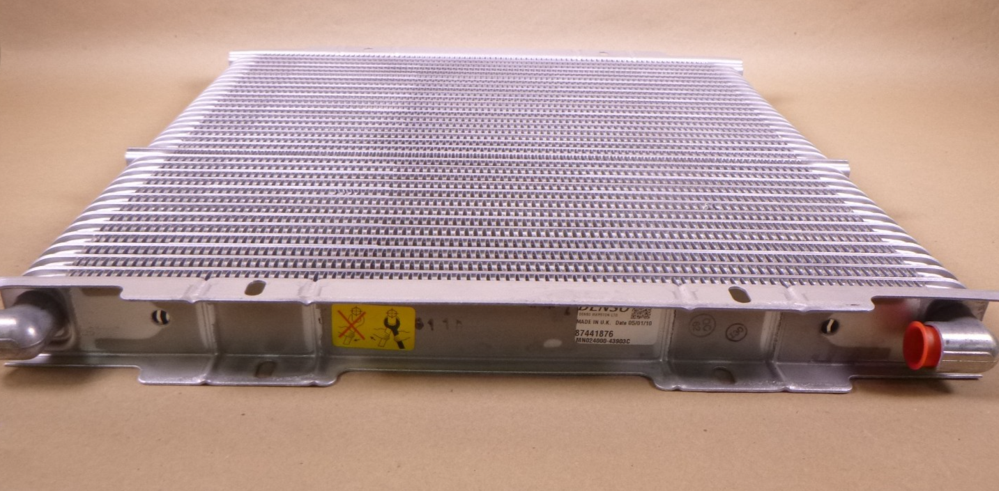 Genuine CNH Case 87441876 Oil Cooler For 580M 580N 586G 588G 590SM 570NXT OEM | Industrial Tractor Parts Supplier and Surplus Tractor Parts & Accessories