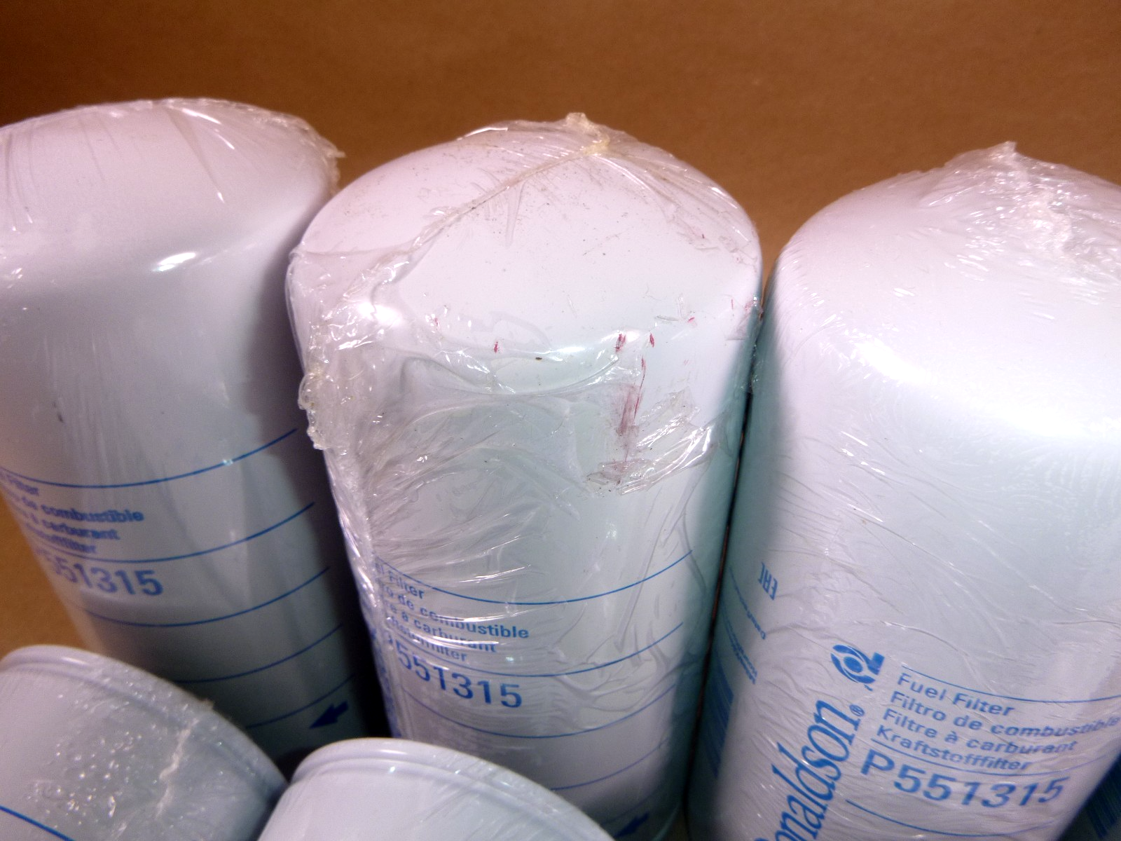 P551315 Donaldson Fuel Filter (Lot of 8) 1R-0751, FF5321, 33377 Fits Caterpillar *ONE DENT* | Industrial Tractor Parts Supplier and Surplus Tractor Parts & Accessories