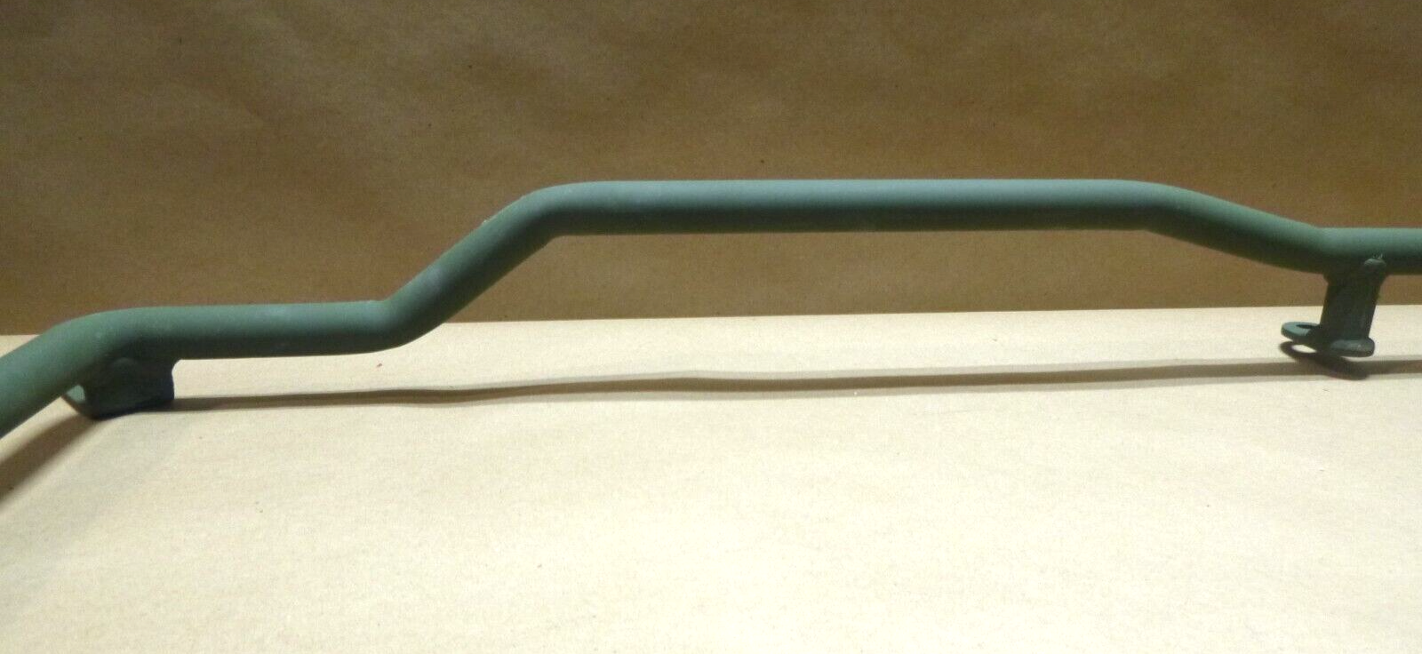 USGI FMTV M1080 PASSENGER SIDE EXTERIOR GRAB HANDLE 12423356, 5340-01-522-0614 | Genuine FMTV Replacement Parts, LMTV Parts For Sale and Military Surplus Medium Tactical Vehicle Parts & Components