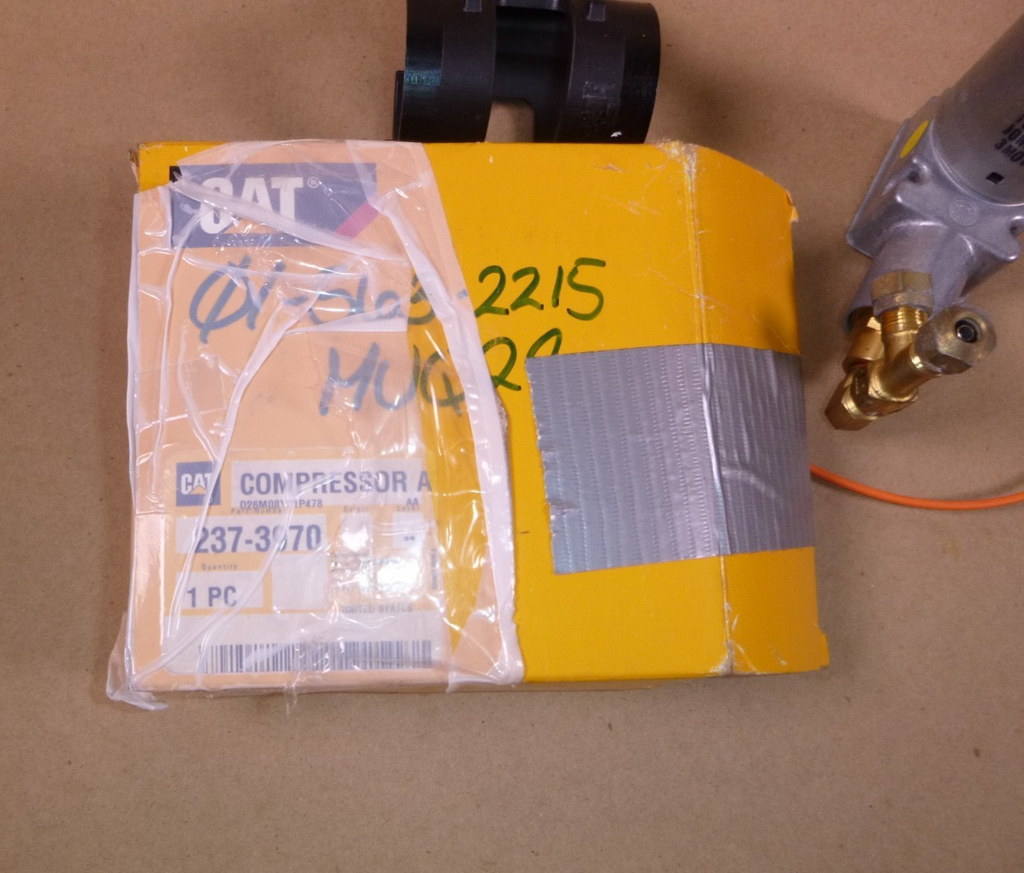 2373970 Genuine OEM Caterpillar 24 Volt Suspension Seat Air Compressor 237-3970 | Industrial Tractor Parts Supplier and Surplus Tractor Parts & Accessories