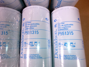 P551315 Donaldson Fuel Filter (Lot of 8) 1R-0751, FF5321, 33377 Fits Caterpillar *ONE DENT* | Industrial Tractor Parts Supplier and Surplus Tractor Parts & Accessories