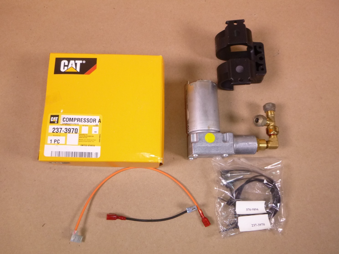 237-3970 Genuine OEM Caterpillar 24 Volt Suspension Seat Air Compressor 2373970 | Industrial Tractor Parts Supplier and Surplus Tractor Parts &amp; Accessories