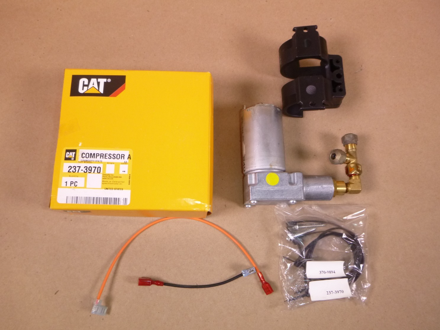 237-3970 Genuine OEM Caterpillar 24 Volt Suspension Seat Air Compressor 2373970 | Industrial Tractor Parts Supplier and Surplus Tractor Parts &amp; Accessories