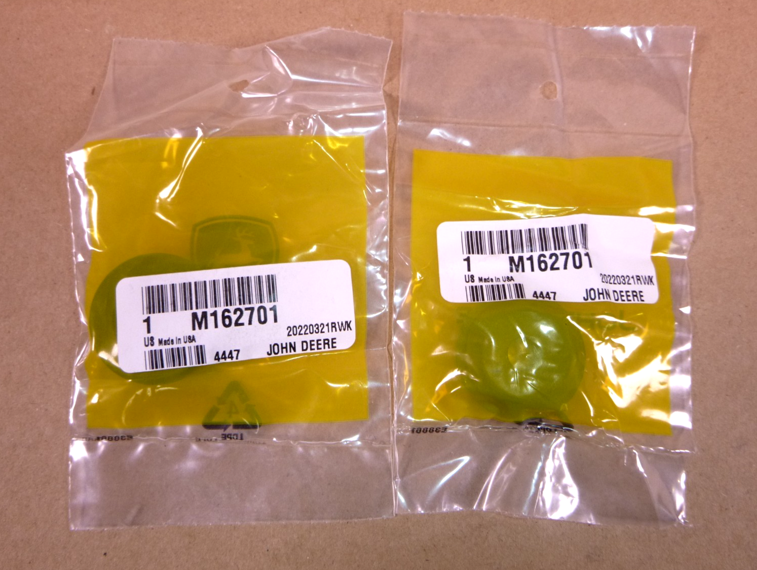M162701 Genuine OEM John Deere Door Grommet (Lot of 2) | Industrial Tractor Parts Supplier and Surplus Tractor Parts &amp; Accessories