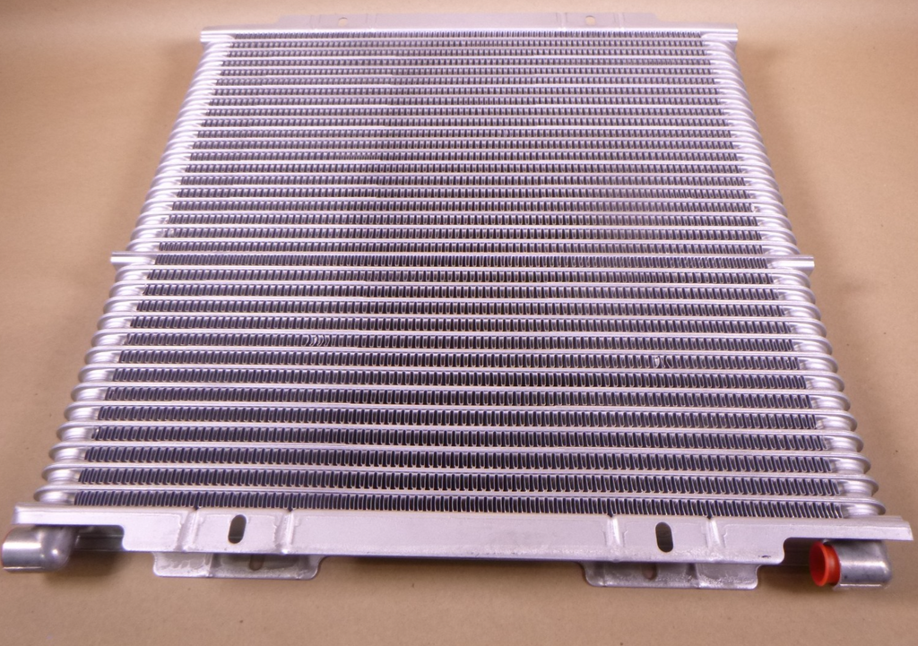 Genuine CNH Case 87441876 Oil Cooler For 580M 580N 586G 588G 590SM 570NXT OEM | Industrial Tractor Parts Supplier and Surplus Tractor Parts & Accessories