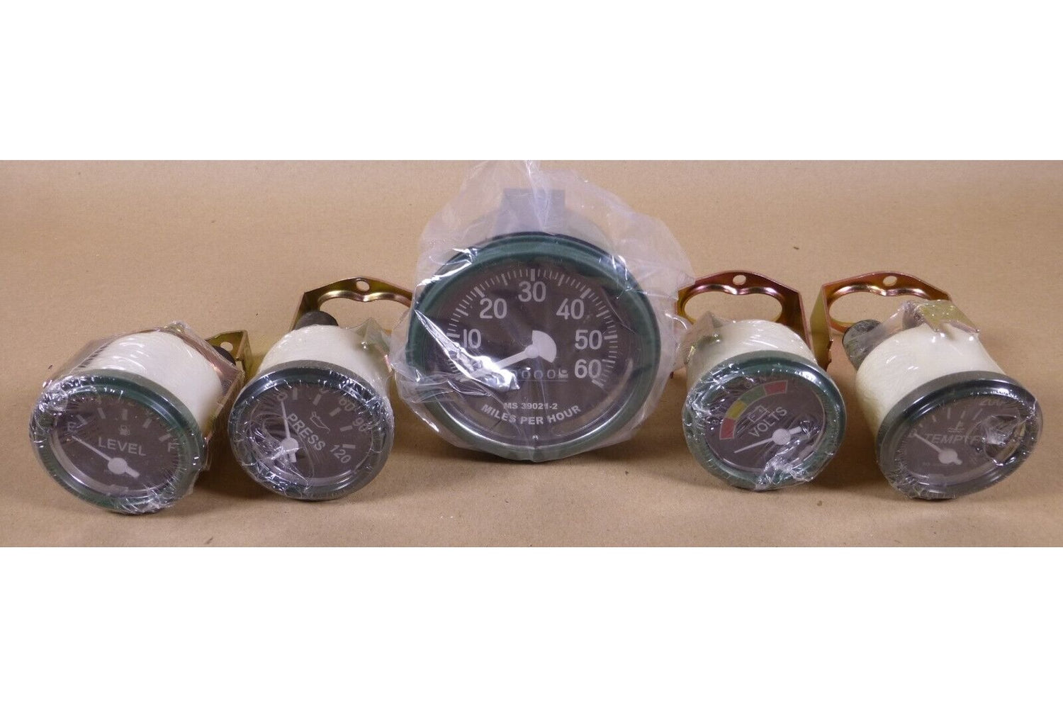 HMMWV M939 M35 M151 5 GAUGE KIT TEMPERATURE VOLTMETER FUEL LEVEL OIL SPEEDOMETER | Genuine M35 Military Truck Parts and M939 Cargo Truck Surplus Parts
