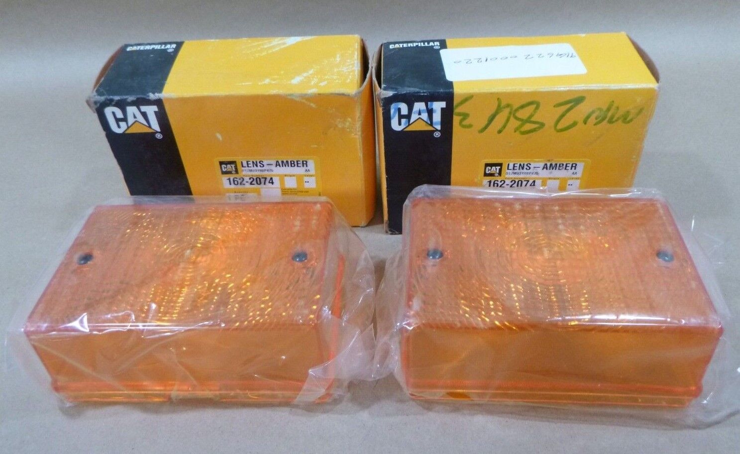 (QTY 2) OEM CAT CATERPILLAR 162-2074 AMBER LENS FOR 914G 914G2 928G 938G 950G | Industrial Tractor Parts Supplier and Surplus Tractor Parts &amp; Accessories