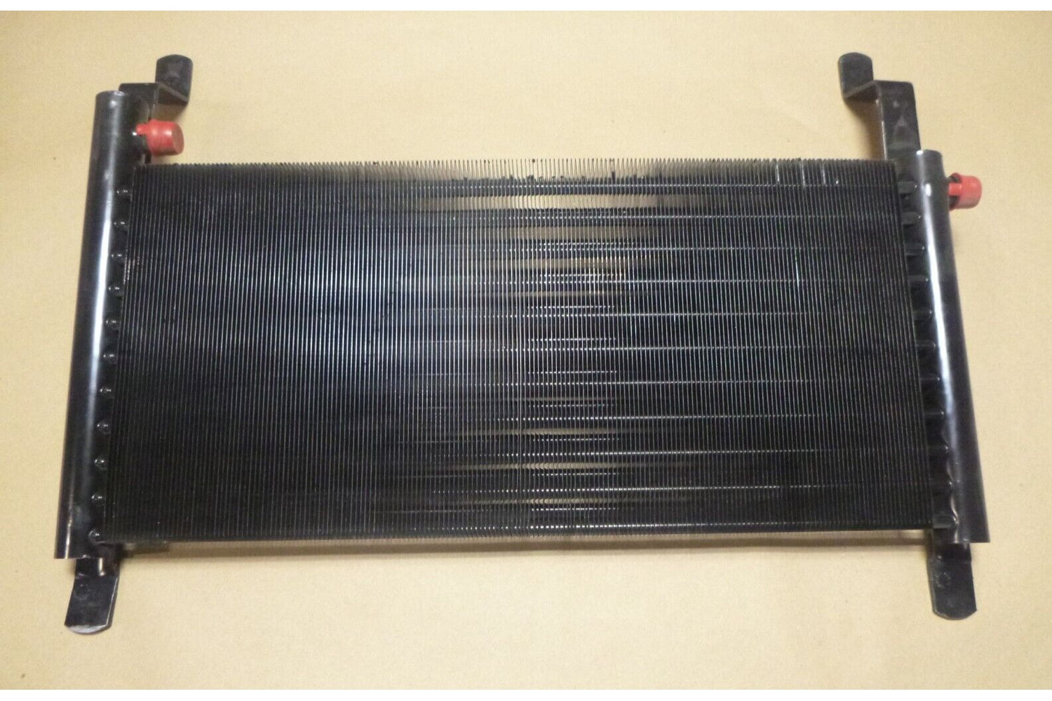 USGI New Genuine Bobcat Oil Cooler 6731045 | Industrial Tractor Parts Supplier and Surplus Tractor Parts &amp; Accessories